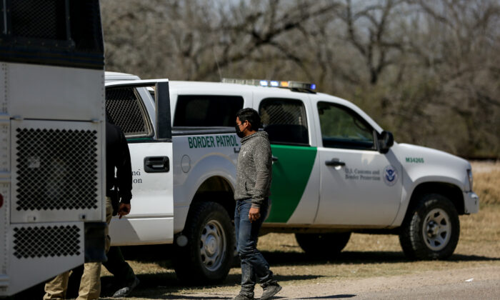 Border Patrol agents apprehend a busload of illegal immigrants in Penitas, Texas, on March 10, 2021. (Charlotte Cuthbertson/The Epoch Times)