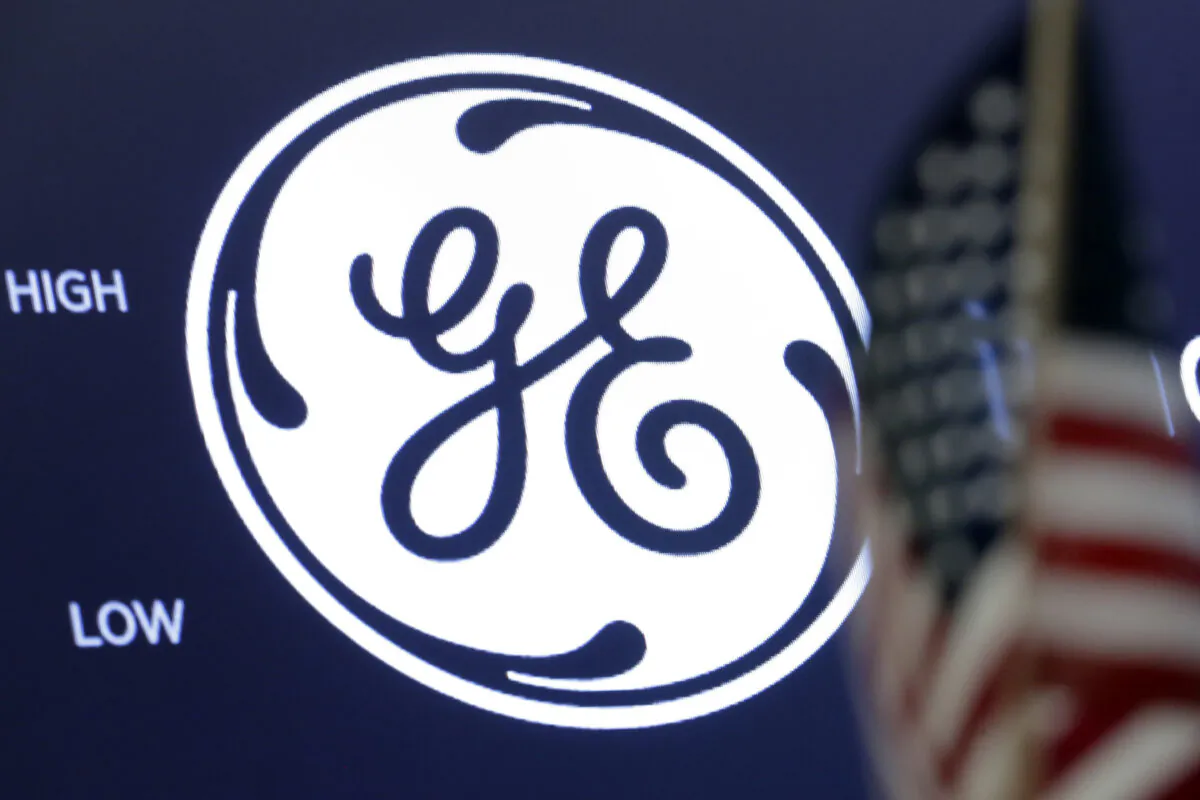 The General Electric logo appears above a trading post on the floor of the New York Stock Exchange in New York City, on June 28, 2018. (Richard Drew/AP Photo)