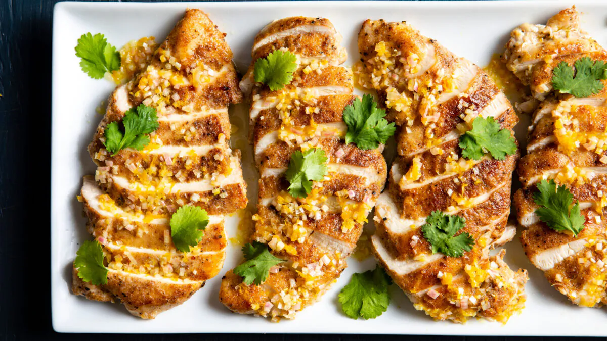 Slicing the cooked chicken before topping it with the vinaigrette made each bite well-seasoned. (America's Test Kitchen/TNS)