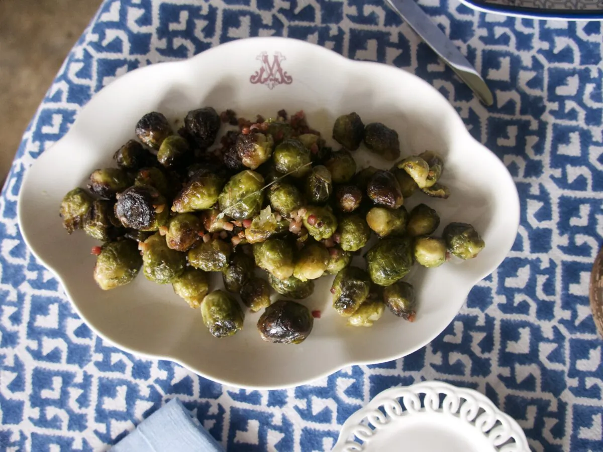 A sprinkling of chopped pancetta adds saltiness and smokiness to these simply roasted sprouts. (Victoria de la Maza)