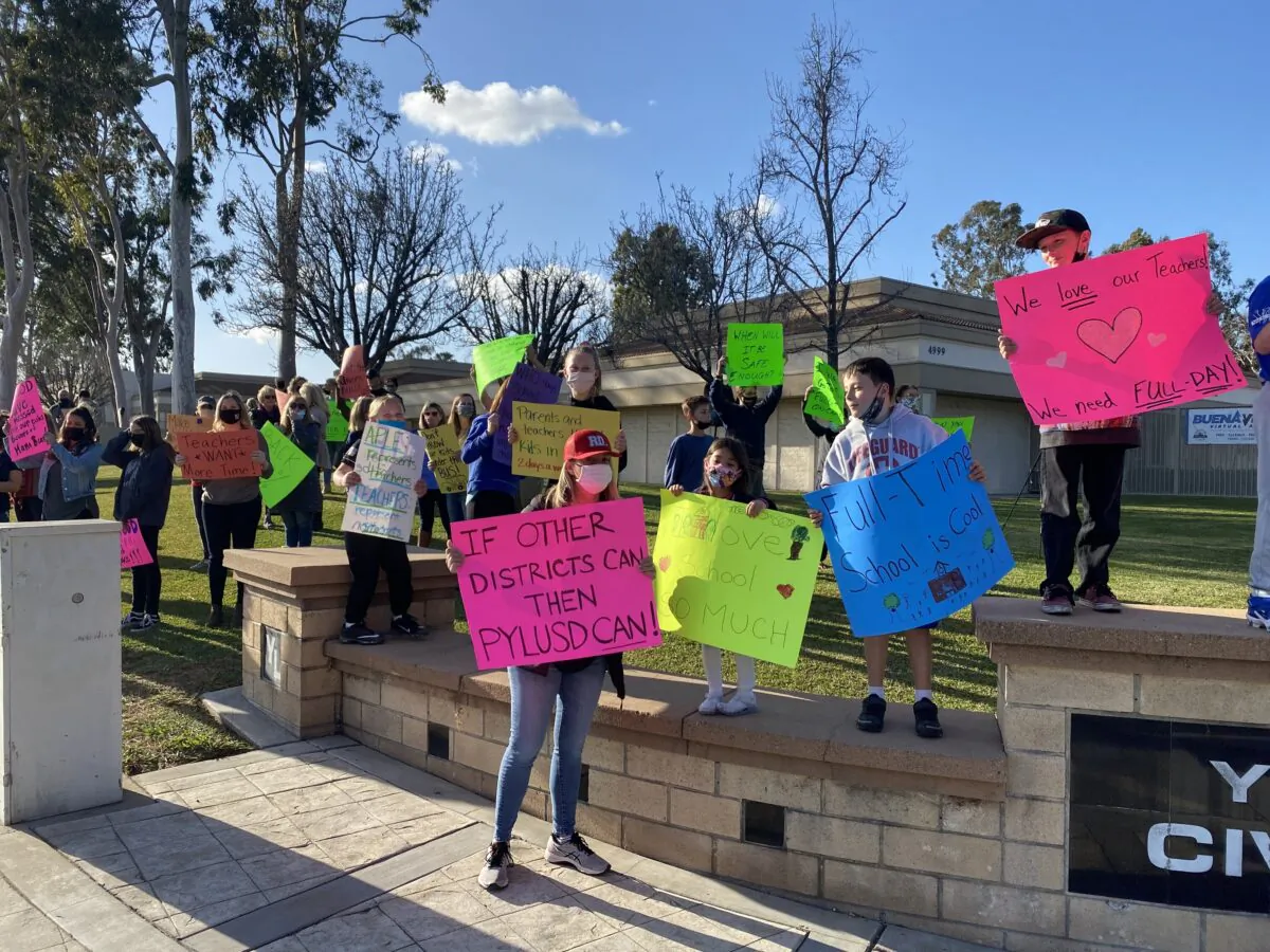 Placentia-Yorba Linda Unified School District students gather on March 9 in support of reopening schools. (Jack Bradley/The Epoch Times)