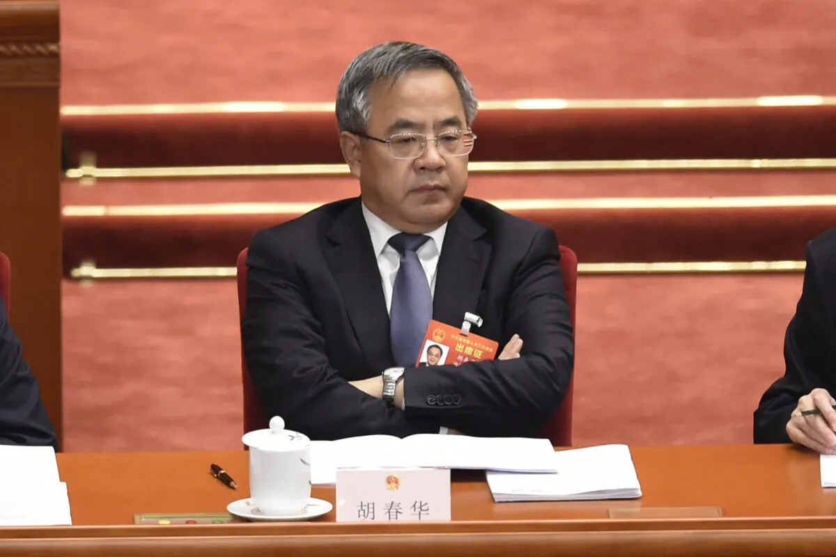 Chinese Vice Premier Hu Chunhua attends the opening session of the regime’s rubber-stamp legislature’s conference in Beijing on March 5, 2019. (Wang Zhao/AFP via Getty Images)