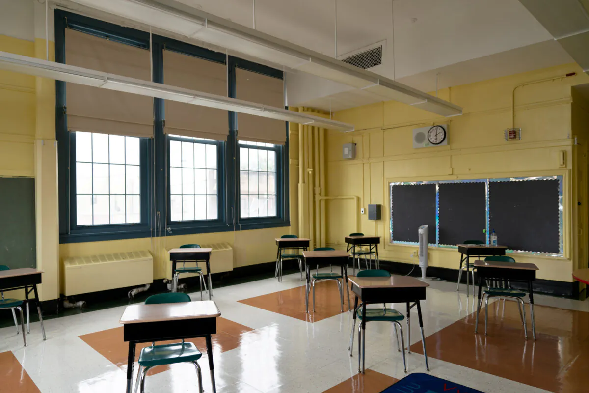 Students' desk adhere to social distancing requirements in a classroom during a news conference at New Bridges Elementary School, ahead of schools reopening, in the Brooklyn borough of New York City, on Aug. 19, 2020. (Jeenah Moon/Reuters)