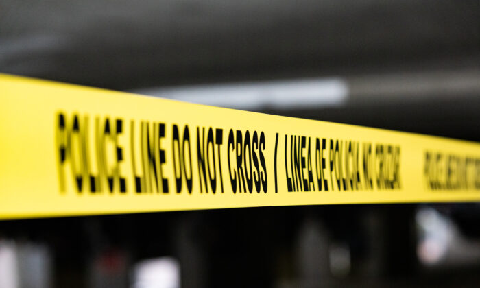 Crime scene tape in Santa Ana, Calif., on March 11, 2021. (John Fredricks/The Epoch Times)