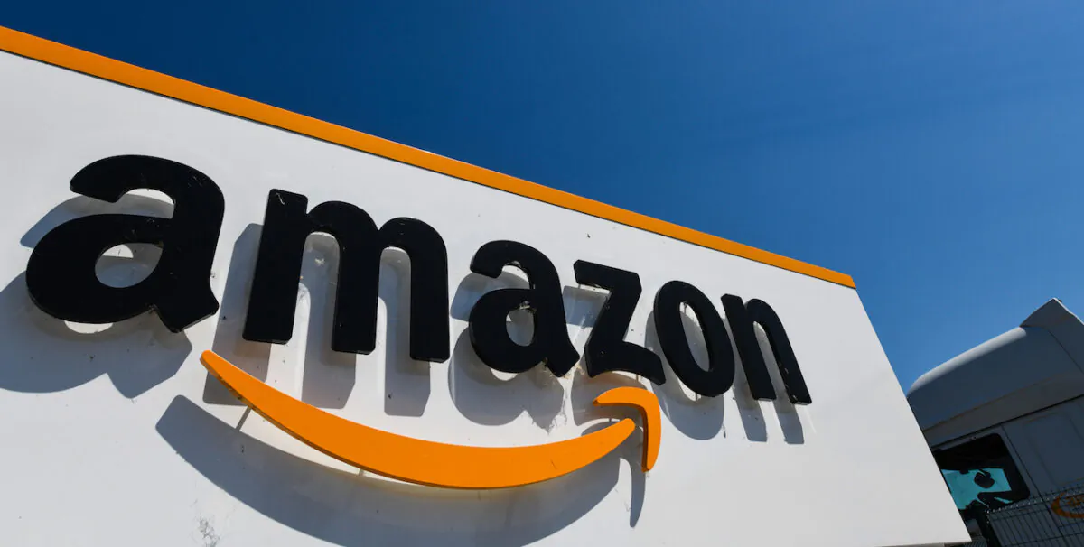 A picture shows the Amazon logo at the entrance area of the Amazon logistics centre in Amiens, northern France, on July 23, 2019. (Denis Charlet/AFP via Getty Images)