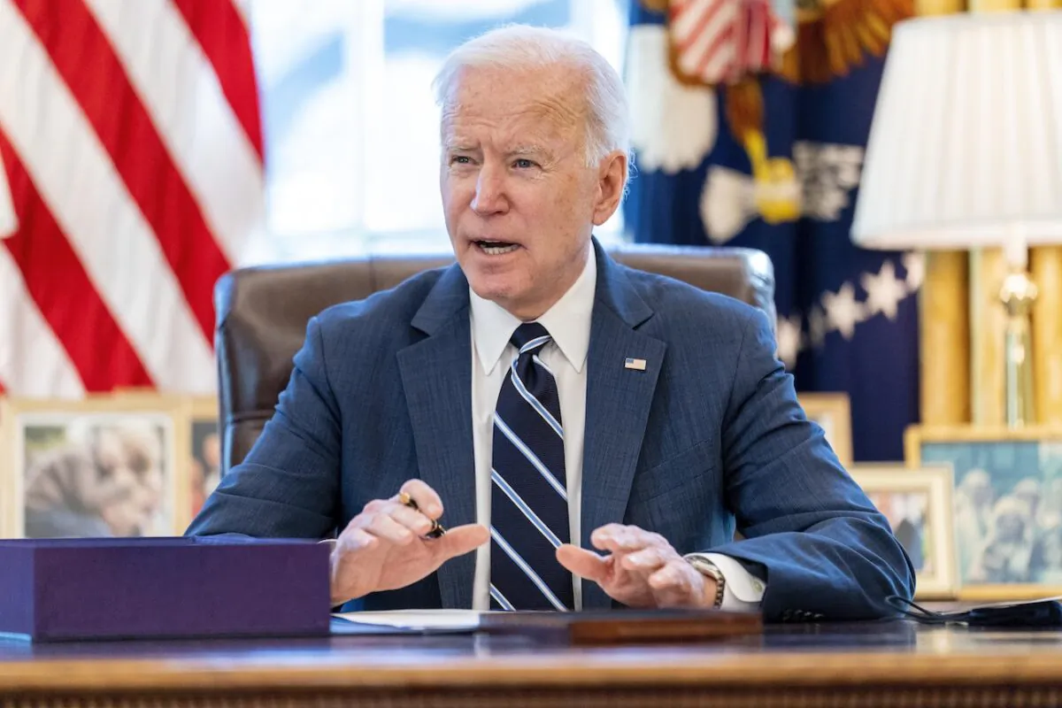 President Joe Biden speaks before signing the American Rescue Plan, a CCP virus relief package, in the Oval Office of the White House in Washington, on March 11, 2021. (Andrew Harnik/AP Photo)