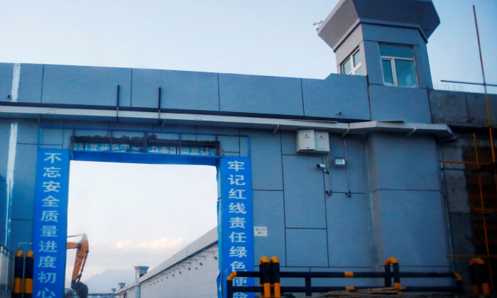 A gate of what is officially known as a vocational skills education center is located in Dabancheng, in Xinjiang Uyghur Autonomous Region, China, on Sept. 4, 2018. (Thomas Peter/Reuters)