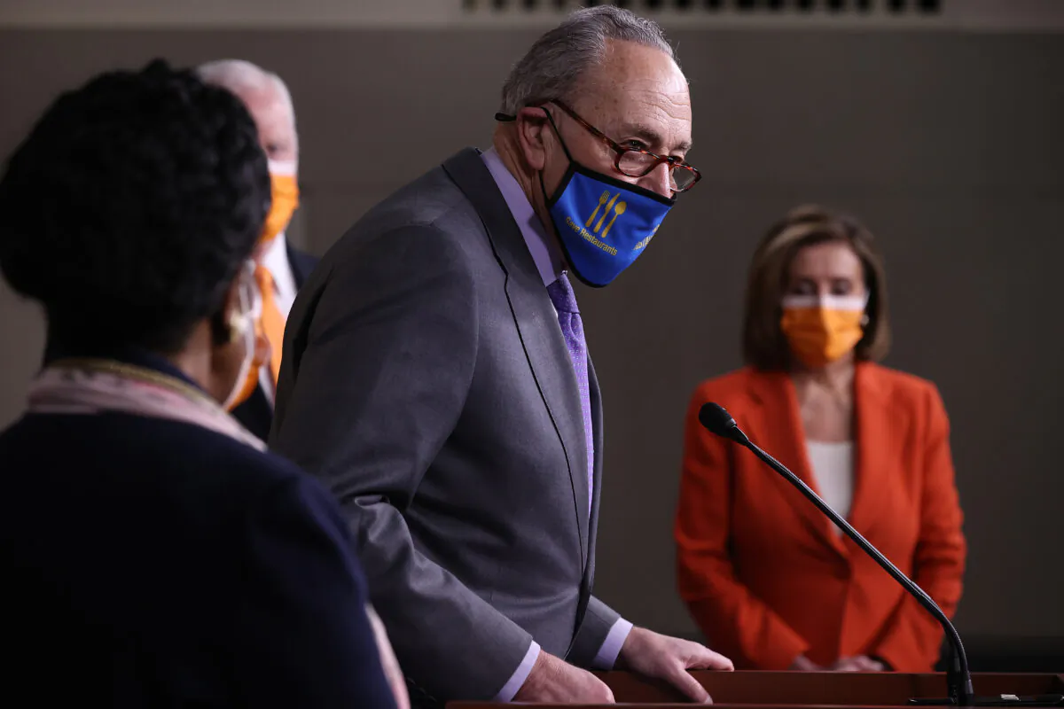 Senate Majority Leader Charles Schumer (D-N.Y.) speaks to reporters on Capitol Hill in Washington on March 11, 2021. (Chip Somodevilla/Getty Images)