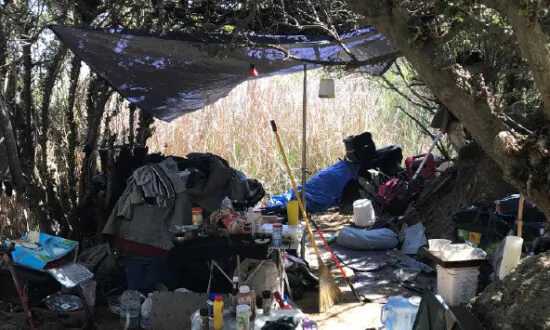 Huntington Beach Police Remove Homeless Occupying Wetlands 