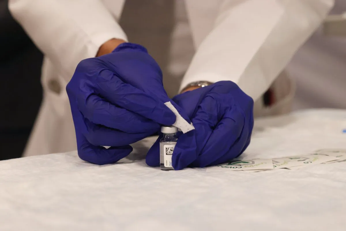 A medical worker at South Shore University Hospital administers the newly available Johnson & Johnson COVID-19 vaccine in Bay Shore, N.Y., on March 3 2021. (Spencer Platt/Getty Images)