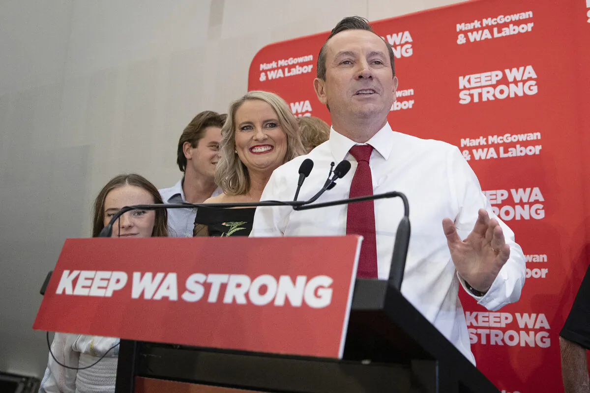 After a landslide victory, re-elected Premier of WA Mark McGowan makes a speech with his family by his side at the Gary Holland Community Centre 
in Rockingham, Australia, on March 13, 2021. (Will Russell/Getty Images)