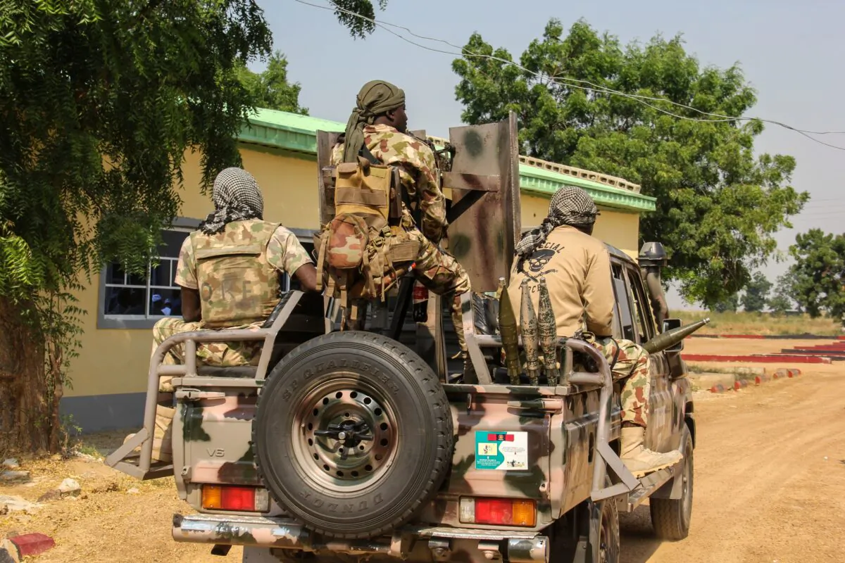 Nigerian Army soldiers driving on a military vehicle in Ngamdu, Nigeria in a file photo. (Audu Marte/AFP via Getty Images)