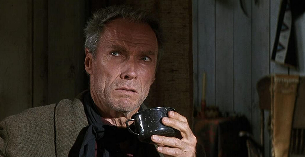 man drinks coffee in unforgiven in Five Westerns That Capture the Essence of the American Wild West