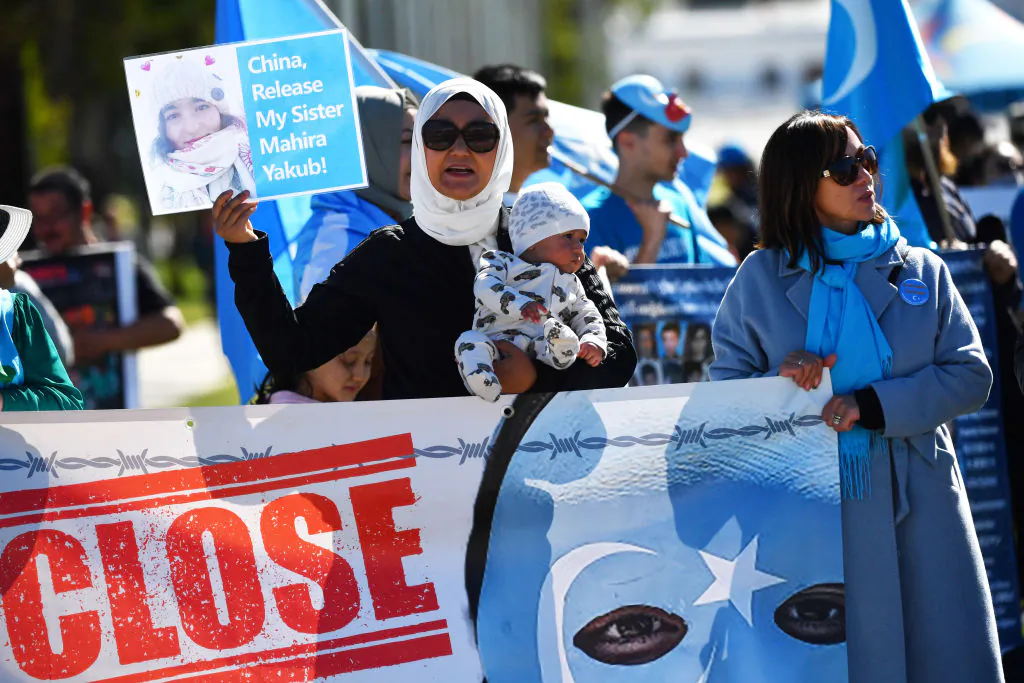 Protestors attend a rally for the Uyghur community at Parliament House on March 15, 2021 in Canberra, Australia.  (Sam Mooy/Getty Images)
