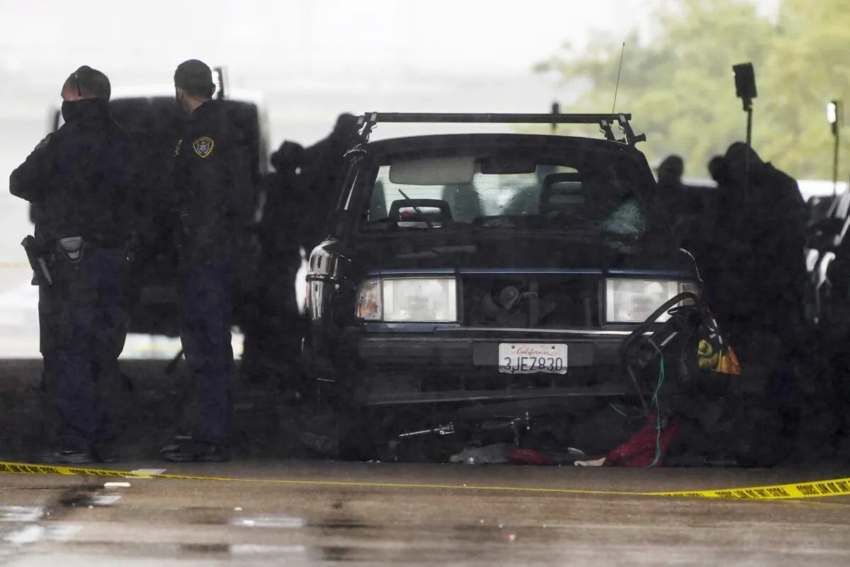 A car involved in a deadly accident sits at the scene, in San Diego, on March 15, 2021. (Gregory Bull/AP Photo)