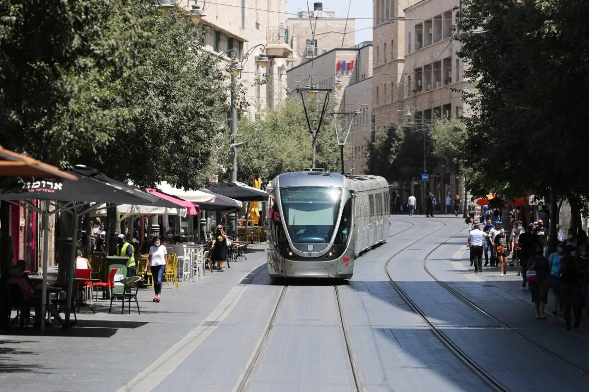 Jerusalem's light rail passes by in a central part of the city amid the spread of the coronavirus disease, on July 7, 2020. (Ammar Awad/Reuters)