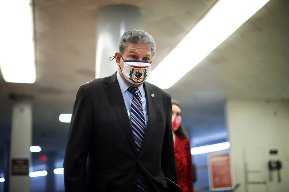 Sen. Joe Manchin (D-W.Va.) arrives at the U.S. Capitol in Washington on Feb. 11, 2021. (Chip Somodevilla/Getty Images)