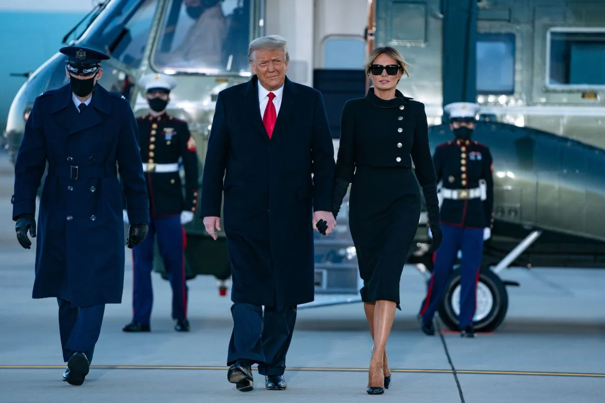 President Donald Trump and First Lady Melania Trump step out of Marine One at Joint Base Andrews in Maryland on Jan. 20, 2021. (Alex Edelman/AFP via Getty Images)