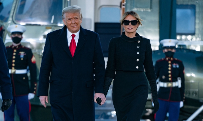 President Donald Trump and First Lady Melania Trump step out of Marine One at Joint Base Andrews in Maryland on Jan. 20, 2021. (Alex Edelman/AFP via Getty Images)