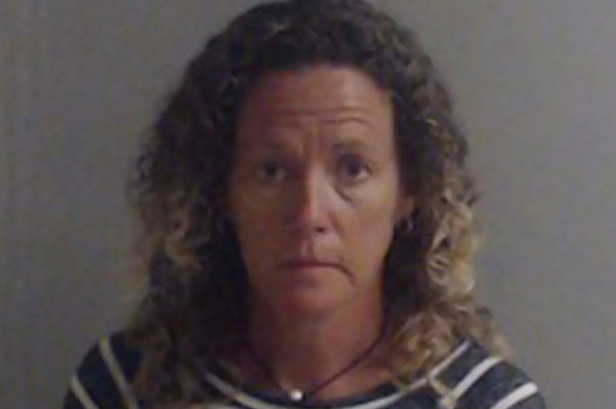Laura Rose Carroll, 50, in booking photo. (Escambia County Jail)