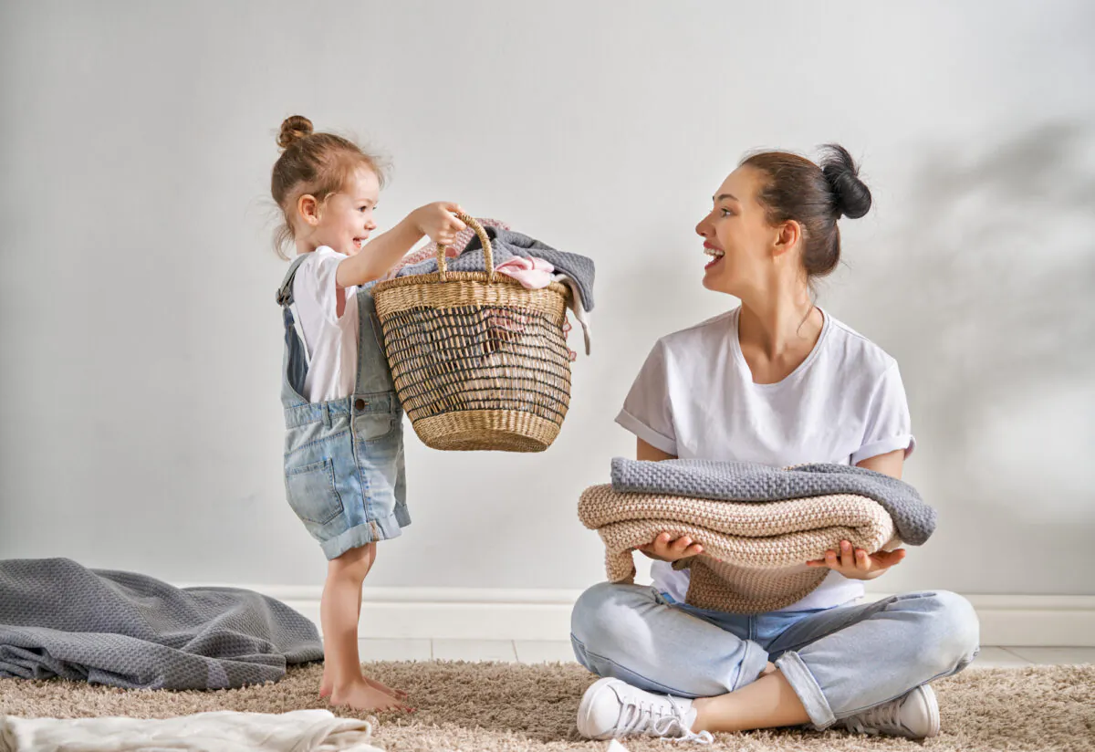 Taking the time to train children to do their chores has long-lasting benefits. (Yuganov Konstantin/Shutterstock)