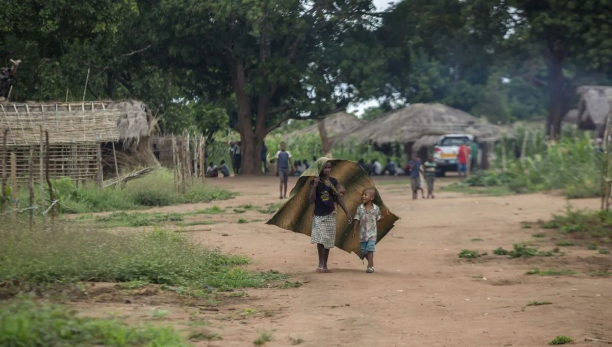 Children walk in the community of Marupa, a relocation center for internally displaced families in the Chiure district, on Feb. 23, 2021. (Alfredo Zuniga/AFP via Getty Images)