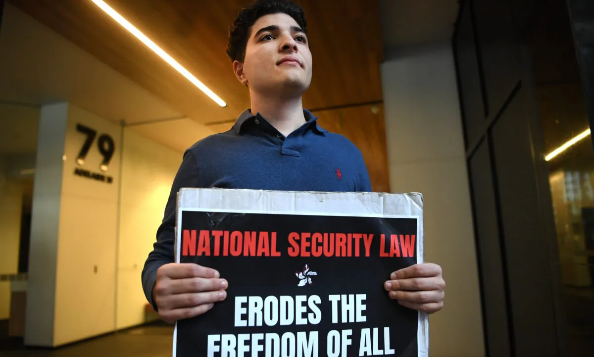 Activist Drew Pavlou takes part in a protest in support of Hong Kong, outside the Chinese consulate in Brisbane, Australia, on May 30, 2020. (Dan Peled/AAP Image)