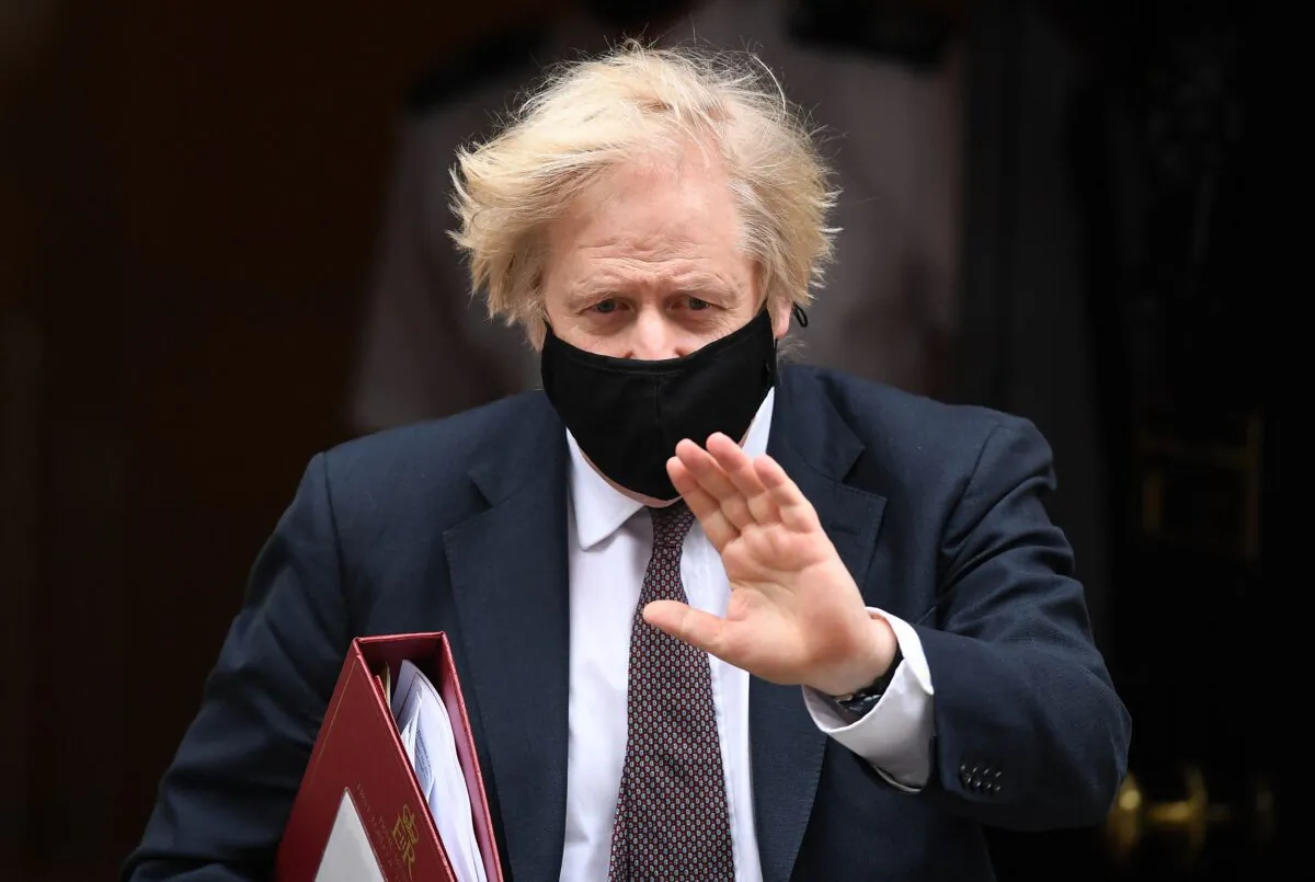 Britain's Prime Minister Boris Johnson leaves 10 Downing Street in central London on March 17, 2021. (Daniel Leal-Olivas/AFP via Getty Images)