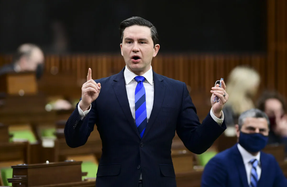 Conservative member of Parliament Pierre Poilievre rises during question period in the House of Commons on Parliament Hill in Ottawa, Canada, on Feb. 19, 2021. (Sean Kilpatrick/The Canadian Press)