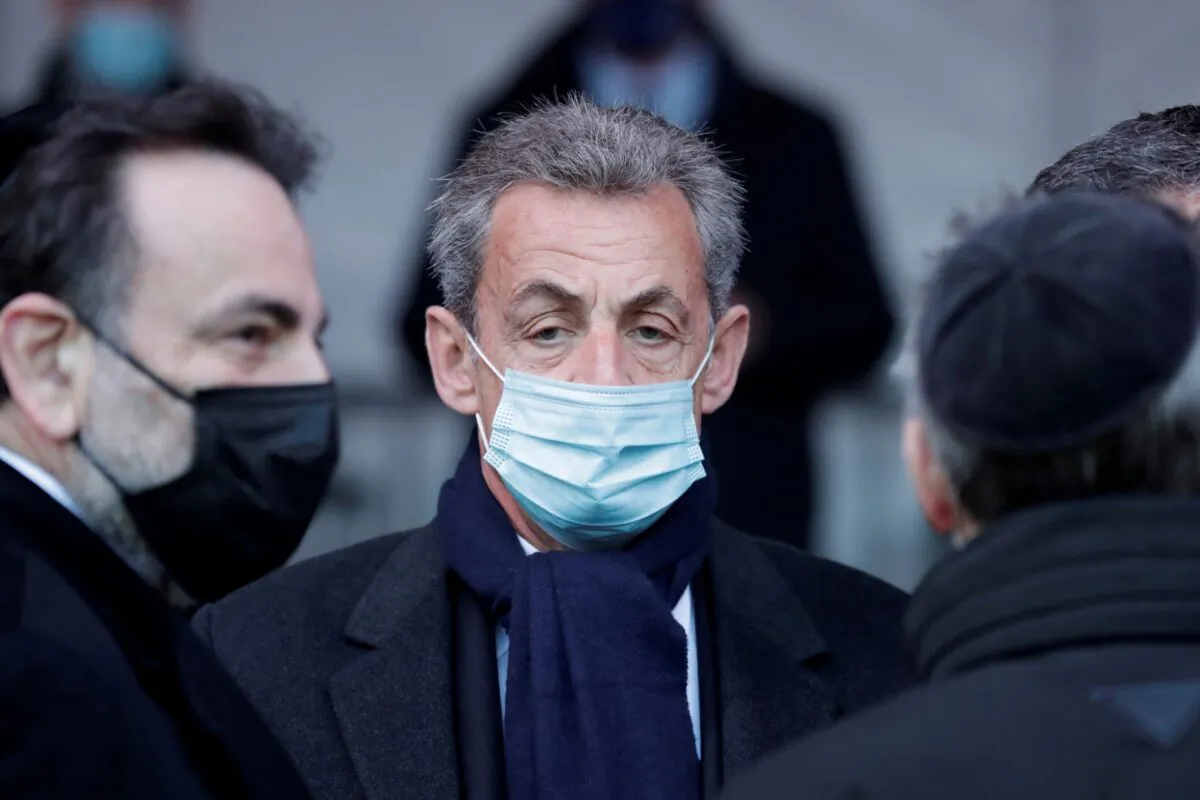 Former French president Nicolas Sarkozy waits before a ceremony paying homage to the victims of terrorism at the Invalides monument in Paris, France, on March 11, 2021. (Thibault Camus/Pool via Reuters)