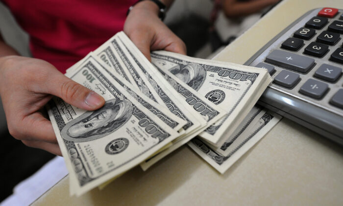 U.S. dollar notes are seen on Aug. 28, 2009. (Hoang Dinh Nam/AFP via Getty Images)