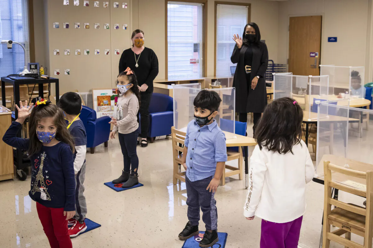 Children are seen in a preschool classroom at Dawes Elementary School in Chicago, Ill., on Jan. 11, 2021. (Ashlee Rezin Garcia/Chicago Sun-Times via AP)