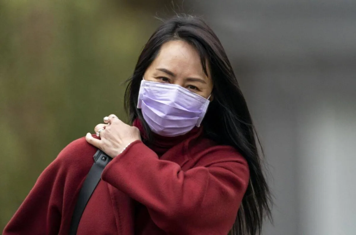 Chief Financial Officer of Huawei Meng Wanzhou leaves her home in Vancouver, on March 18, 2021. (Jonathan Hayward/The Canadian Press)