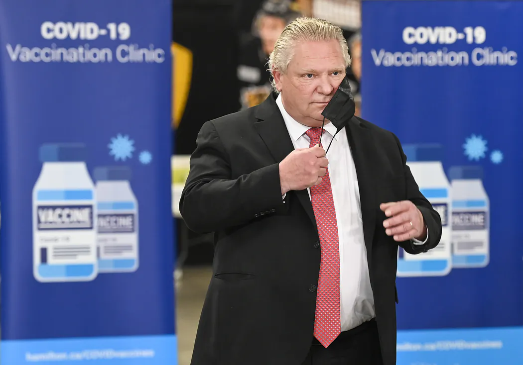 Ontario Premier Doug Ford attends a press conference after touring a mass COVID-19 vaccination site during the COVID-19 pandemic in Hamilton, Ont., on March 18, 2021. (Nathan Denette/The Canadian Press)