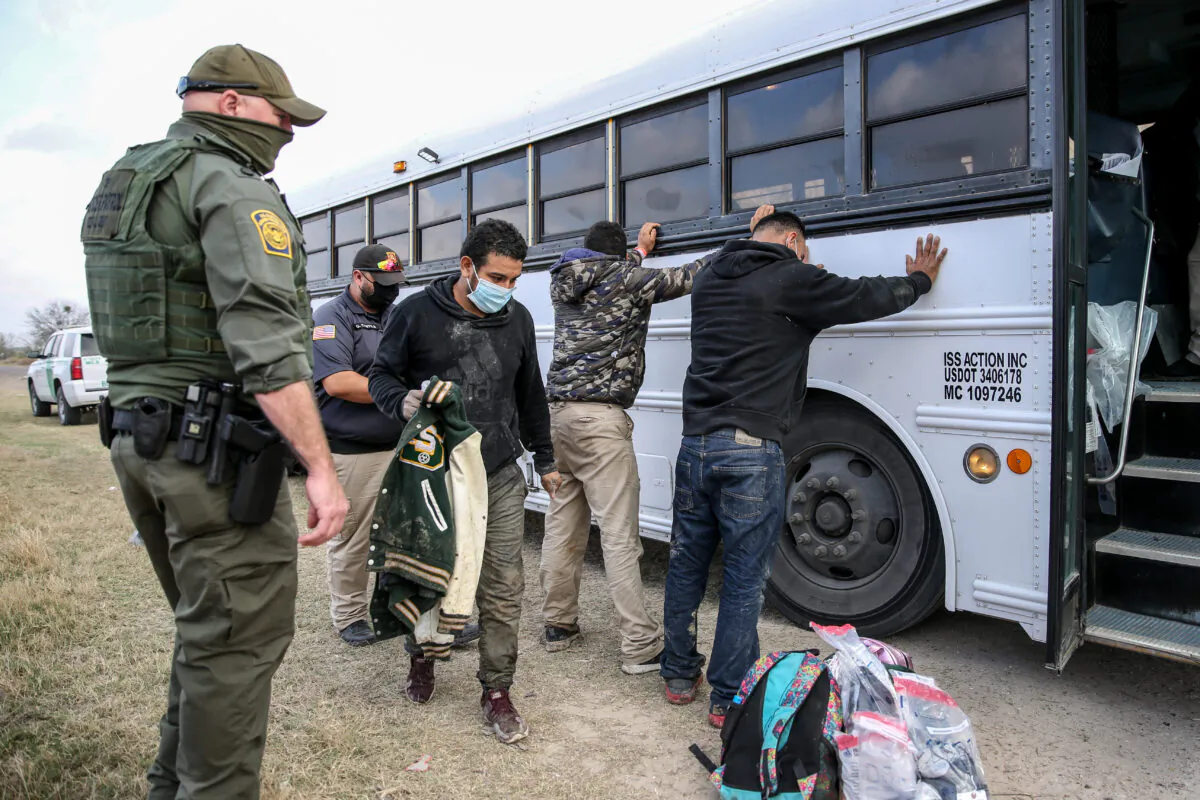 Border Patrol agents apprehend about two dozen illegal immigrants in Penitas, Texas, on March 11, 2021. (Charlotte Cuthbertson/The Epoch Times)