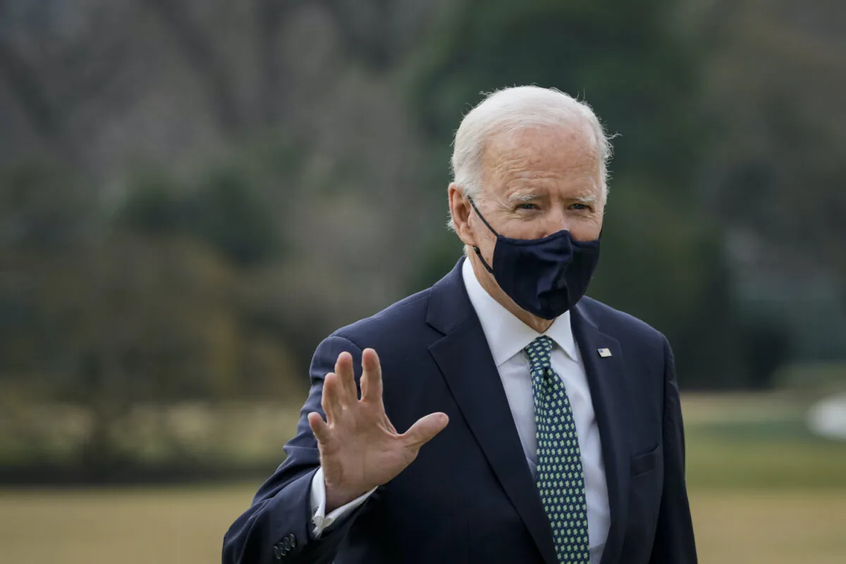 U.S. President Joe Biden walks to the Oval Office after exiting Marine One on the South Lawn of the White House in Washington on March 17, 2021. (Drew Angerer/Getty Images)