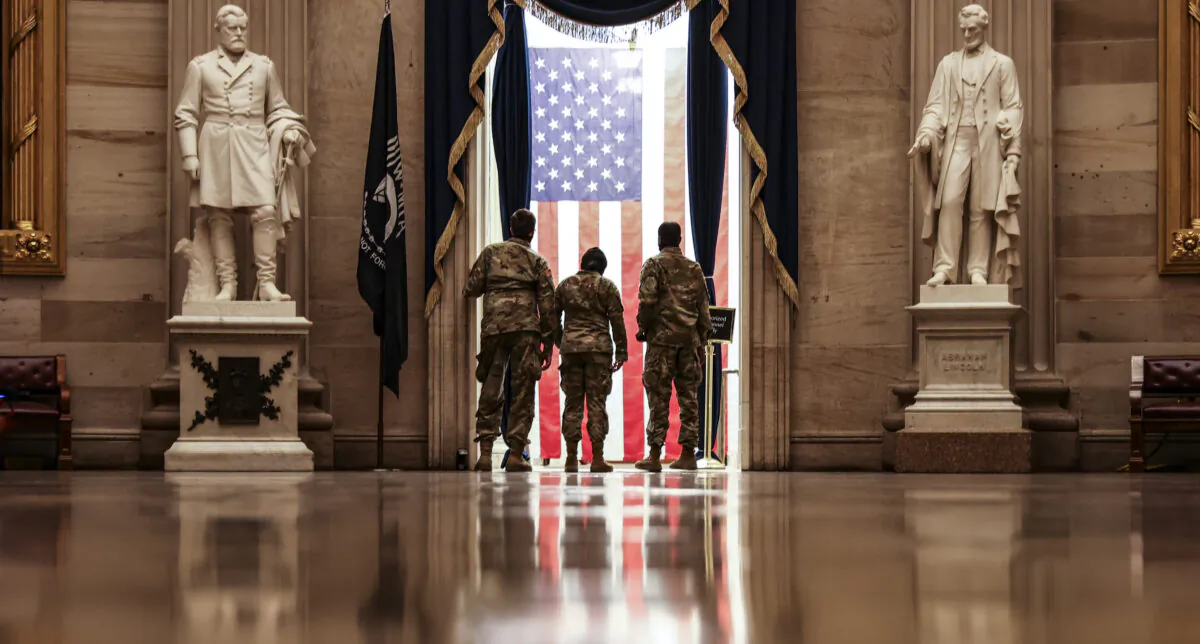Members of the National Guard from Delaware tour the rotunda during their down time at the Capitol in Washington on Jan. 13, 2021. (Tasos Katopodis/Getty Images)
