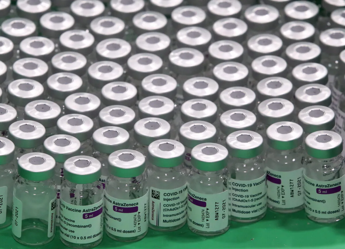 Empty vials of Oxford/AstraZeneca's COVID-19 vaccine are seen at a vaccination centre in Antwerp, Belgium March 18, 2021. (Yves Herman/Reuters)