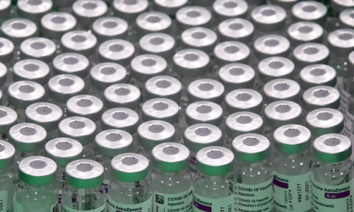 Empty vials of Oxford/AstraZeneca's COVID-19 vaccine are seen at a vaccination centre in Antwerp, Belgium March 18, 2021. (Yves Herman/Reuters)