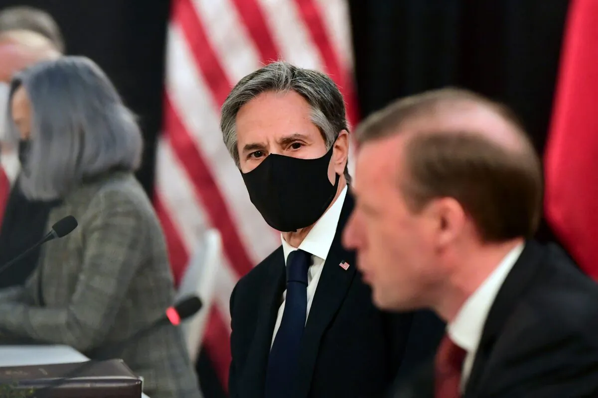 US National Security Advisor Jake Sullivan (R) speaks as US Secretary of State Antony Blinken (C) looks on at the opening session of US-China talks at the Captain Cook Hotel in Anchorage, Alaska on March 18, 2021. (Frederic J. Brown/AFP via Getty Images)