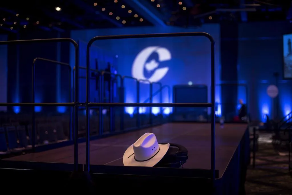 A cowboy hat is left inside an empty ballroom at the Conservative national convention in Halifax on Aug. 25, 2018. (Darren Calabrese/The Canadian Press)