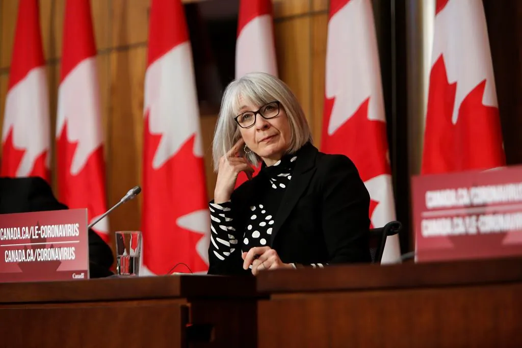 Health Minister Patty Hajdu listens at a COVID-19 press conference in Ottawa, Canada, on Dec. 11, 2020. (The Canadian Press/David Kawai)