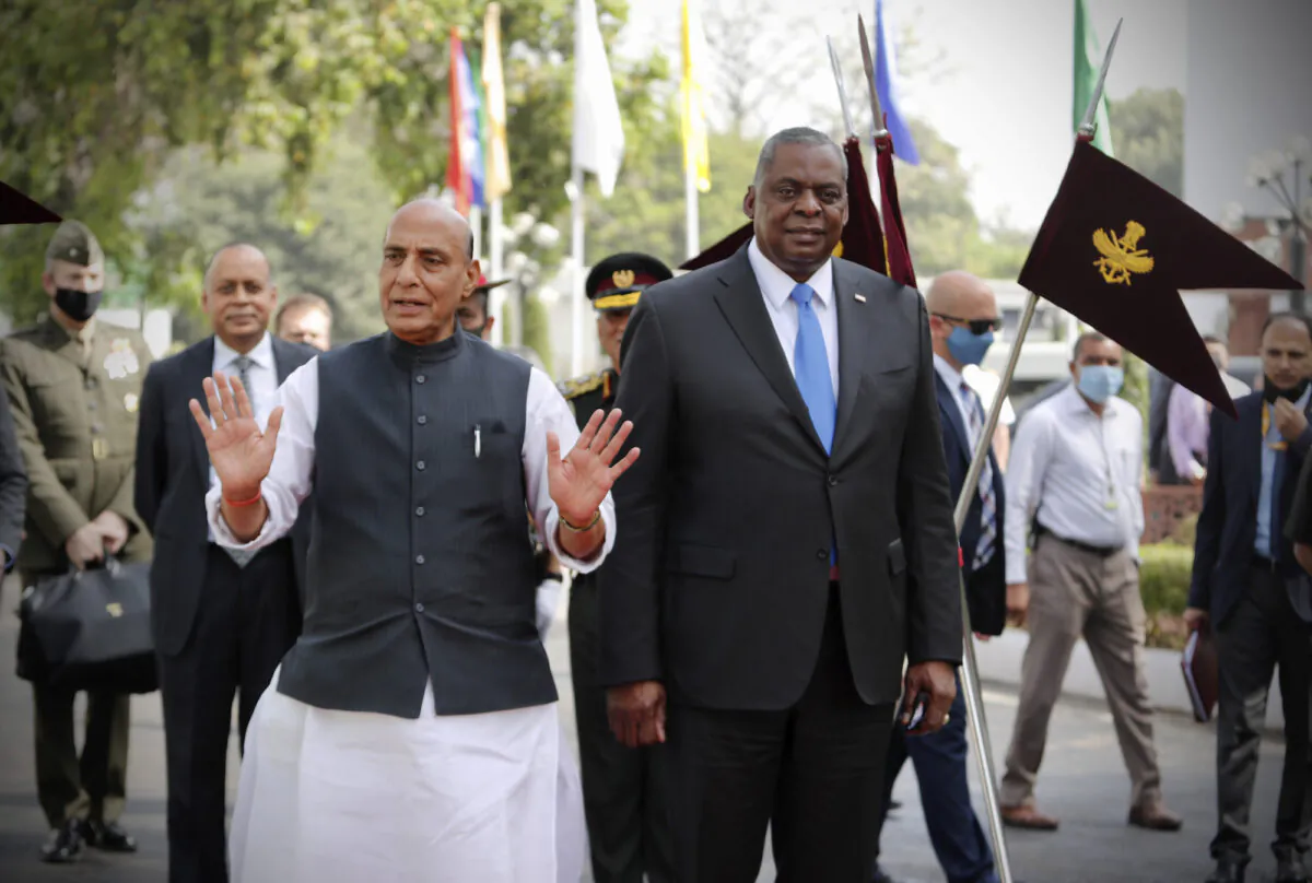 U.S. Defense Secretary Lloyd Austin (R) walks with Indian Defense Minister Rajnath Singh (L) in New Delhi, India, on March 20, 2021. (Manish Swarup/AP Photo)