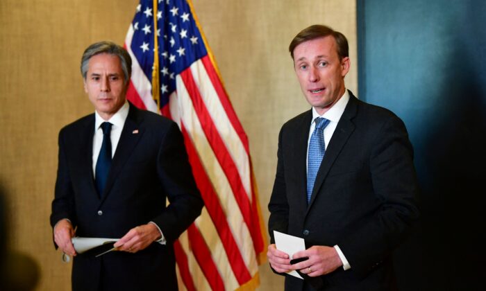 U.S. Secretary of State Antony Blinken (L) and national security adviser Jake Sullivan (R) address the media following the closed-door morning talks between the United States and China upon the conclusion of their two-day meetings in Anchorage, Alaska, on March 19, 2021. (Frederic J. Brown/POOL/AFP via Getty Images)