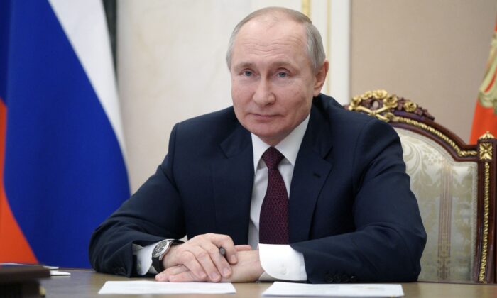 Russian President Vladimir Putin meets with members of the public of Crimea via a video link in Moscow on March 18, 2021. (Alexey Druzhinin/Sputnik/AFP via Getty Images)