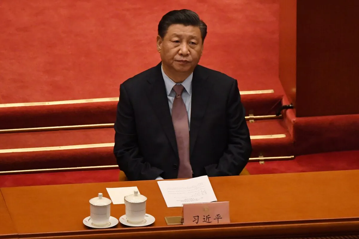 Chinese leader Xi Jinping attends the opening ceremony of the Chinese People's Political Consultative Conference (CPPCC) at the Great Hall of the People in Beijing, on March 4, 2021. (Leo Ramirez/AFP via Getty Images)