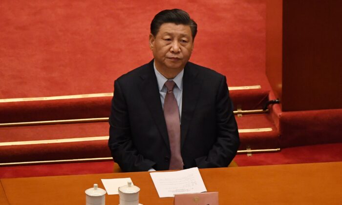 Chinese leader Xi Jinping attends the opening ceremony of the Chinese People's Political Consultative Conference (CPPCC) in Beijing on March 4, 2021. (Leo Ramirez/AFP via Getty Images)