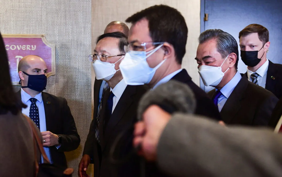 The Chinese delegation led by Yang Jiechi (2nd L), director of the Central Foreign Affairs Commission Office of the Chinese Communist Party and China's state councilor and foreign minister, Wang Yi (2nd R) depart the ballroom at the conclusion of talks between the United States and China in Anchorage, Alaska, on March 19, 2021. (Frederic J. Brown/Pool via Reuters)