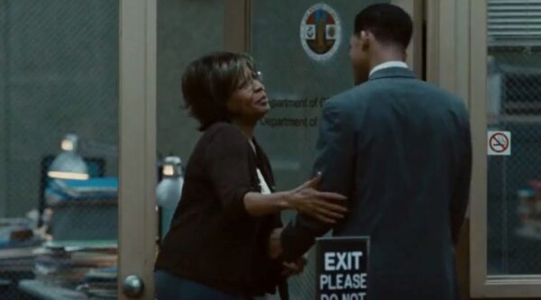 older black lady thanking young black man