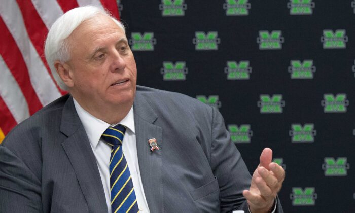 West Virginia Gov. Jim Justice attends a roundtable discussion on the opioid epidemic at the Cabell-Huntington Health Department in Huntington, W. Va., on July 8, 2019. (Saul Loe/AFP via Getty Images)